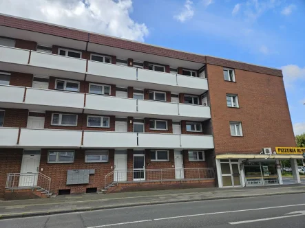 Gepflegtes Mehrfamilienhaus in Mo-Scherpenberg - Wohnung kaufen in Moers - Top Kapitalanlage: gut vermietete 2-Zimmer-Wohnung in MO-Scherpenberg