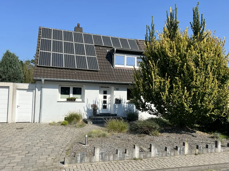 Modernisierte DHH in Rheinberg - Haus kaufen in Rheinberg - Modernisierte DHH in familienfreundlicher Lage von Rheinberg