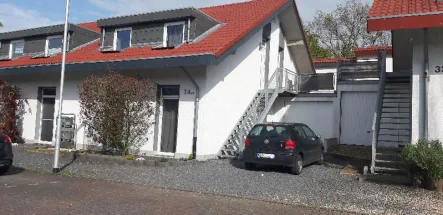  - Wohnung kaufen in Goch - nicht alltägl Eigentumswohnung: Erdgeschoss mit Garten, eig. Eingang und Garage: -VERKAUFT-