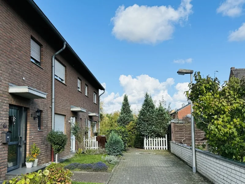 Hoeninger Str. 4 41542 Dormagen - Haus kaufen in Dormagen - Geräumiges Reihenhaus in ruhiger Wohnlage