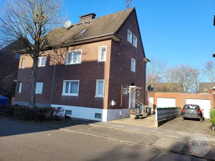 Straßenansicht - Haus kaufen in Bergheim - gemütliches Einfamilienhaus mit Charme in Bergheim-Quadrath, bezugsfrei