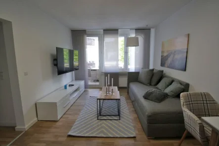 Wohnzimmer - Wohnung mieten in Köln - Top-möblierte 2-Zimmerwohnung