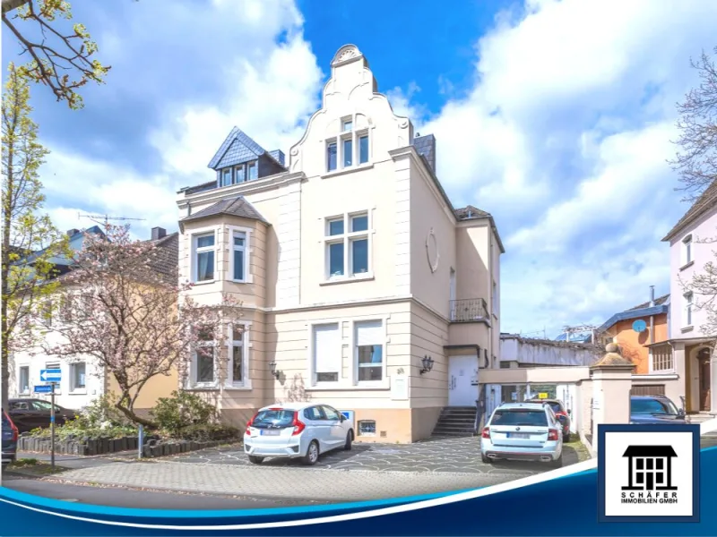  - Haus kaufen in Rheinbach - Zentrales Wohn-/Geschäftshaus mit drei Einheiten