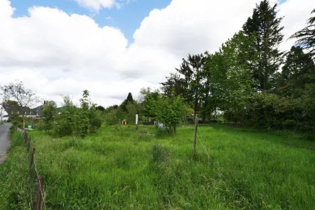 Investition mit Weitblick - Grundstück kaufen in Bad Honnef - Eine Investition mit Weitblick! Heute Garten und zusätzlich Spekulaton auf Bauland.