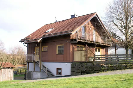 Bild1 - Haus kaufen in Neunkirchen-Seelscheid - Viel Platz im Haus und Garten - ideal für die große Familie: Hochwertiges Holzblockhaus Nähe Neunkirchen-Seelscheid