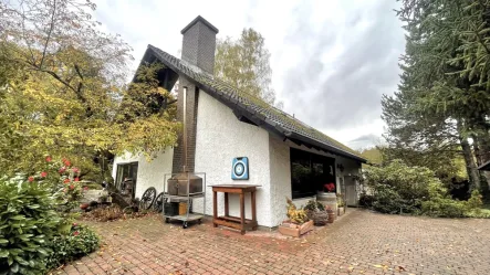 Vorderansicht - Haus kaufen in Hagenbach - Charmantes Einfamilienhaus in Hagenbach: Wohnkomfort und Idylle vereint