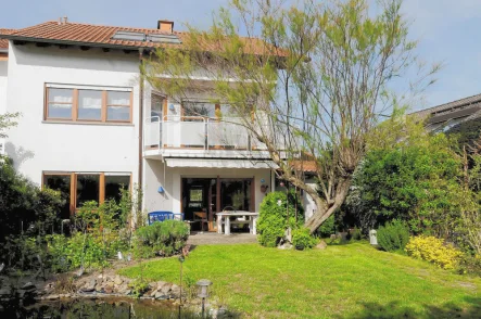 Gartenansicht - Haus kaufen in Ludwigshafen am Rhein - Schickes Einfamilienhaus mit viel Wohnfläche in beliebter Wohnlage von Ludwigshafen Gartenstadt