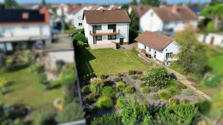 Rückansicht - Haus kaufen in Dannstadt-Schauernheim - Ein- bis Zweifamilienhaus mit großem Garten in ruhiger Lage Dannstadts