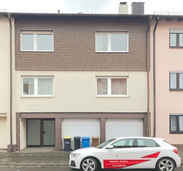 Straßenansicht - Haus kaufen in Ludwigshafen am Rhein - Zwei- bis Vierfamilienhaus mit extravaganter Wohnung im Erd- und Obergeschoss