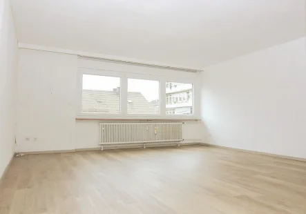 Wohnzimmer - Wohnung mieten in Ludwigshafen - Charmante 2-Zimmer Wohnung inmitten der Ludwigshafener Innenstadt