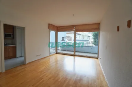 Wohnzimmer - Wohnung kaufen in Bad Neuenahr-Ahrweiler - Wohnen in der Ahrarkade - Hochwertige 3-Zimmer-Wohnung mit zwei Bäder und separater Küche mit EBK!