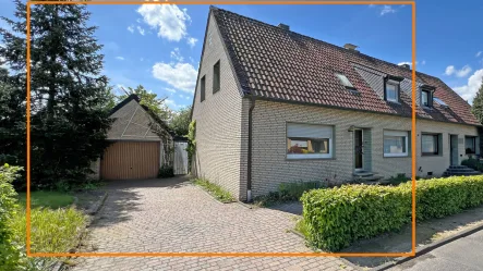 Außenansicht - Haus kaufen in Rheinberg - Sanierungsbedürftige Doppelhaushälfte mit Baugrundstück in Rheinberg Ossenberg!