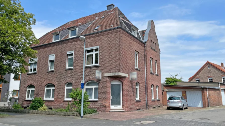 Außenansicht - Haus kaufen in Wesel - Attraktives Mehrfamilienhaus mit Gewerbeeinheit in zentraler Lage von Wesel-Fusternberg zu verkaufen!