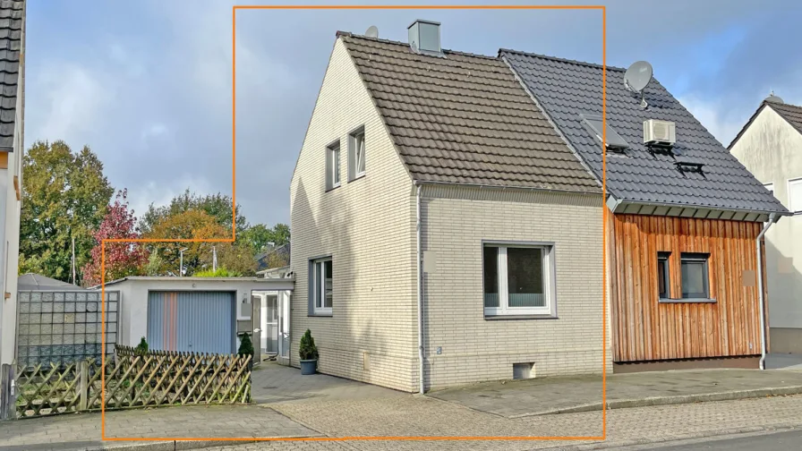 Außenansicht - Haus kaufen in Neukirchen-Vluyn - Gemütliches Eigenheim mit Terrasse und Garage in Vluyn: Ideales Zuhause für Paare oder kleine Familien!