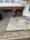 Garage mit vorgelagertem Stellplatz