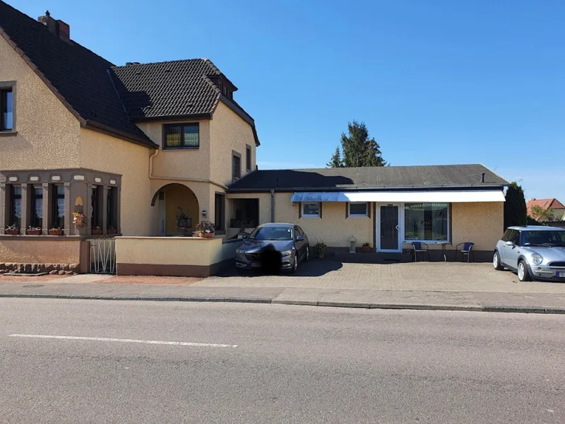 Straßenseite - Gastgewerbe/Hotel kaufen in Homburg - Renditestarkes Mehrfamilienhaus / Pension in Homburg