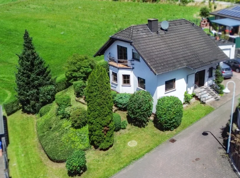  - Haus kaufen in Horhausen - Zentrumsort 56593 Horhausen! Einfamilienhaus mit Garage und Hobbyraum in Sackgassenlage!