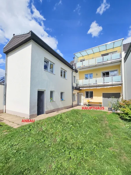 Rückansicht - Haus kaufen in Sankt Augustin - Fairer Preis und ein großes Raumangebot in St. Augustin! Ideal für Handwerker. 3 Min. Kreuz BN/SU!