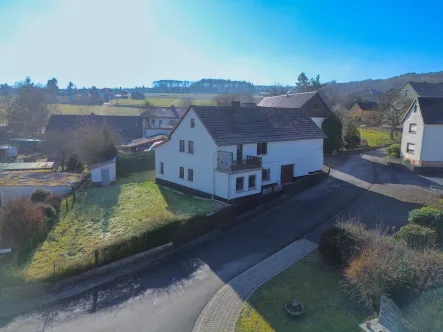 Frontansicht - Haus kaufen in Horhausen - Gepflegtes Bauernhaus mit Scheune und viel Potenzial im ruhigen OT Horhausen!