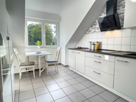 Küche mit moderner Einbauküche - Wohnung kaufen in Dülmen - Helle, naturnahe Maisonette-Wohnung zum Wohlfühlen