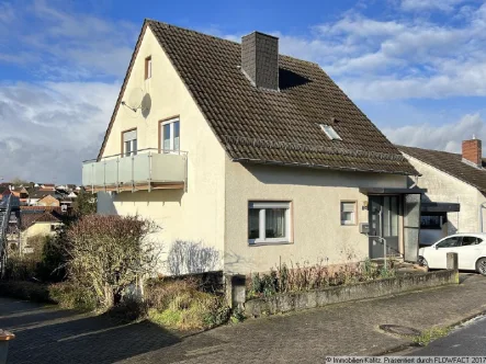 Strassenseite - Haus kaufen in Münchweiler - Wohnhaus mit zwei Einheiten und guter Verkehrsanbindung