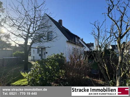 Vorderansicht - Haus kaufen in Steinhagen - Freiheit für Familie & Co.!