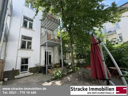 "Lauschiger" Innenhof - Wohnung kaufen in Bielefeld - *Bielefelder Westen – Tolle Altbauwohnung mit  Terrasse*