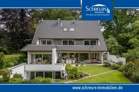 Rückseite Villa - Haus kaufen in Krefeld - Luxuriöses freistehendes Einfamilienhaus in Krefeld Forstwald!