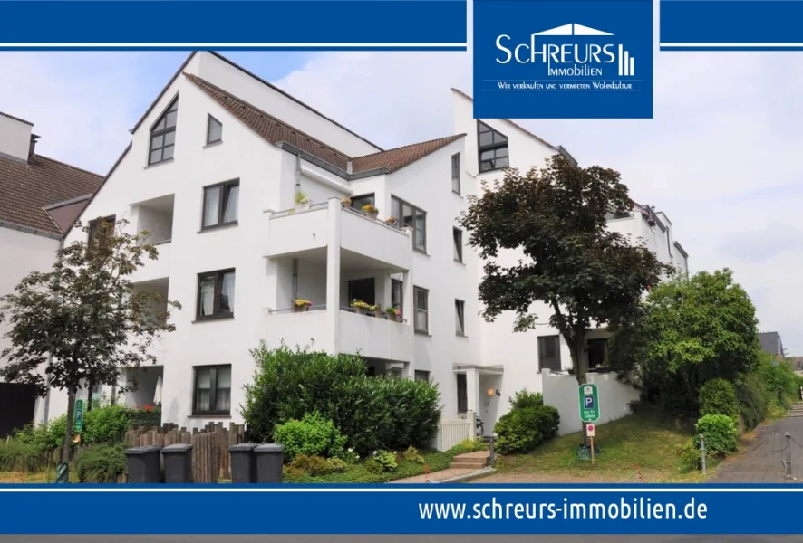 Vorderansicht - Wohnung kaufen in Meerbusch - Schicke vermietete 2-Zi.-Whg. mit gr. Sonnen-Loggia und TG-Stpl. in Toplage von Meerbusch-Büderich!