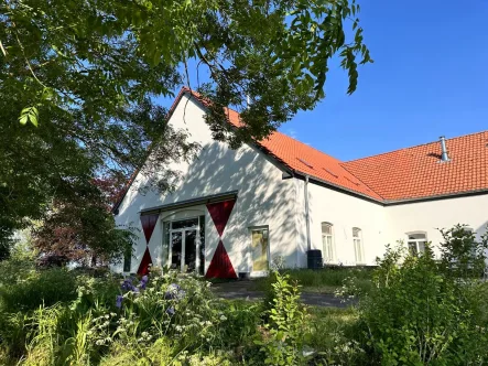 Vorderansicht Homüschemühl in Kleve-Keeken - Haus kaufen in Kleve - Großzügiges Wohnen auf dem Bauernhof „Homüschemühl“, unmittelbar an der niederländischen Grenze!