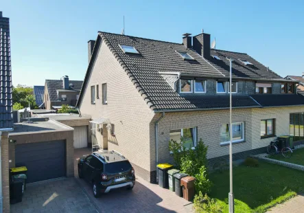  - Haus kaufen in Dormagen / Nievenheim - Teilmodernisierter Familienklassiker