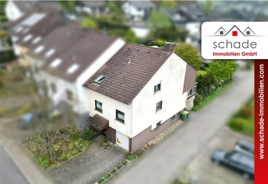 Außenansicht - Haus kaufen in Herscheid - SCHADE IMMOBILIEN - Gemütliches Reihenendhaus im schönen Herscheid zu verkaufen!