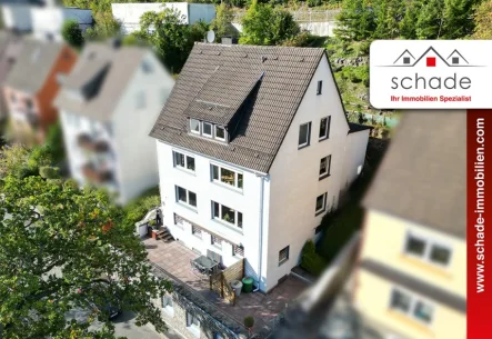 Beispiel Publikation-rot-2024 - Haus kaufen in Werdohl - SCHADE IMMOBILIEN - Über den Dächern von Werdohl. Dreifamilienhaus + Gewerbe im Untergeschoss!