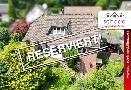 Beispiel Publikation-rot-2022-reserviert - Haus kaufen in Werdohl - SCHADE IMMOBILIEN -  RESERVIERT! Tolles Einfamilienhaus in grüner Waldrandlage von Werdohl!