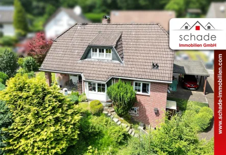 Beispiel Publikation-rot-2022 - Haus kaufen in Werdohl - SCHADE IMMOBILIEN - Tolles Einfamilienhaus in grüner Waldrandlage von Werdohl!