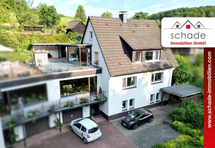 Publikation - Haus kaufen in Plettenberg - SCHADE IMMOBILIEN - Wohnen am Waldrand. Ein-/Zweifamilienhaus mit großem Gartengrundstück.