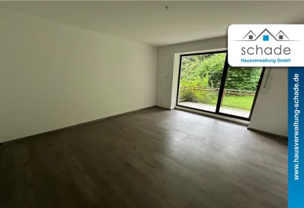 Titelbild - Wohnung mieten in Lüdenscheid - SCHADE HAUSVERWALTUNG - Gemütliche 3-Zimmerwohnung mit Garten im Erdgeschoss zu vermieten!