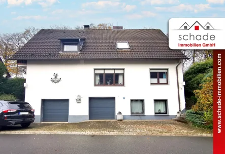 Beispiel Publikation-rot-2022 - Haus kaufen in Lüdenscheid - SCHADE IMMOBILIEN-Teil-vermietetes Zweifamilienhaus in Top-Wohnlage von Lüdenscheid zu verkaufen!