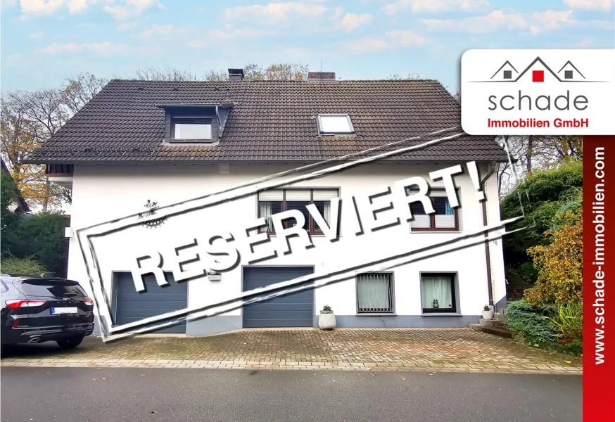 Titelbild - Haus kaufen in Lüdenscheid - SCHADE IMMOBILIEN-Teil-vermietetes Zweifamilienhaus in Top-Wohnlage von Lüdenscheid zu verkaufen!