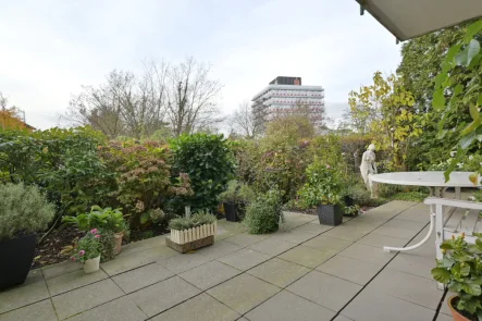 Garten mit Terrasse - Wohnung kaufen in Grevenbroich / Stadtmitte - vermietete Garten-Wohnung in ruhiger aber zentraler Lage des Stadtzentrums