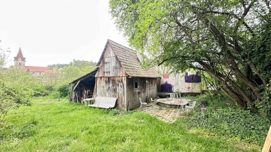 Saunahaus mit Kamin und Tauchbecken