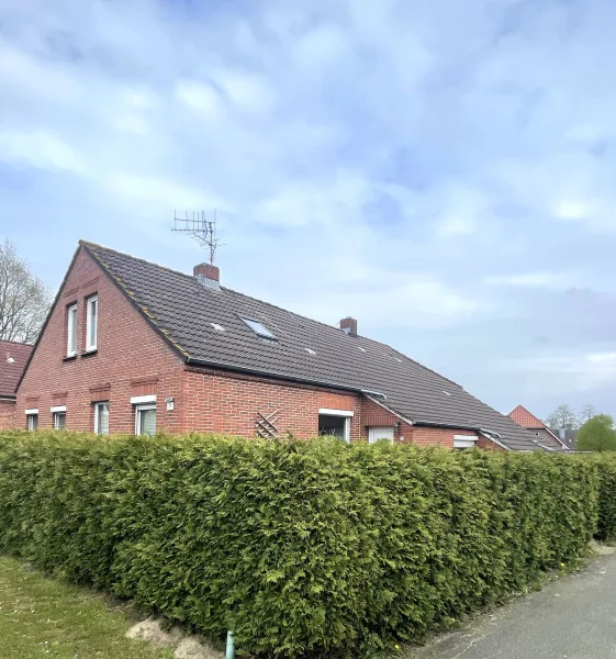 Seitenansicht - Haus kaufen in Weener-Diele - Einfamilienhaus in der Nähe der Meyer Werft in ruhiger Sackgassenlage von Weener-Diele.