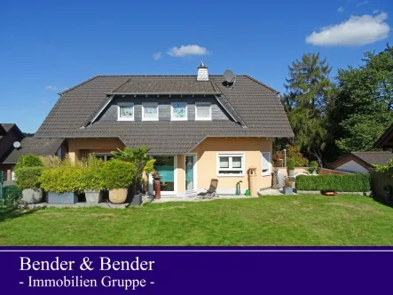 Gartenansicht - Haus kaufen in Ransbach-Baumbach VG - Einfamilienhaus mit vermieteter Einliegerwohnung