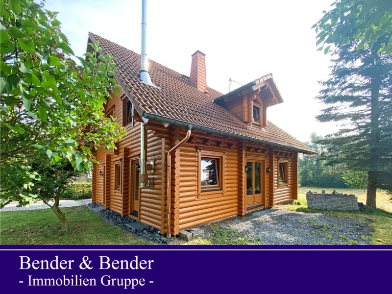  - Haus kaufen in Oberdreis - Freistehendes Holzblockhaus mit Carport in ruhiger Wohnlage!