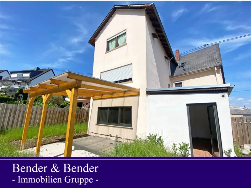 Gartenansicht - Wohnung kaufen in Bassenheim - Sofort einzugsbereit - Tolle Erdgeschosswohnung mit Terrasse und eigenem Garten!