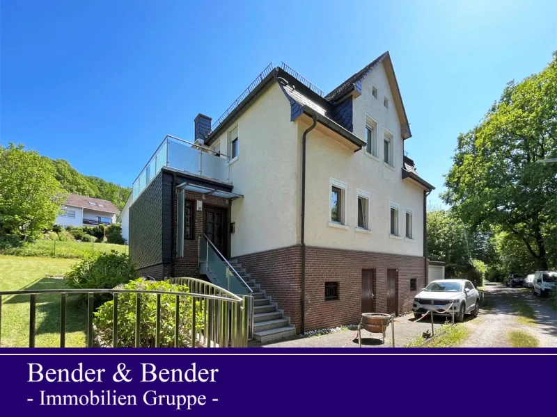Objektansicht - Haus kaufen in Mudersbach - Gepflegtes Einfamilienhaus mit Garten in Waldrandlage - nur 10 Minuten von Siegen entfernt!