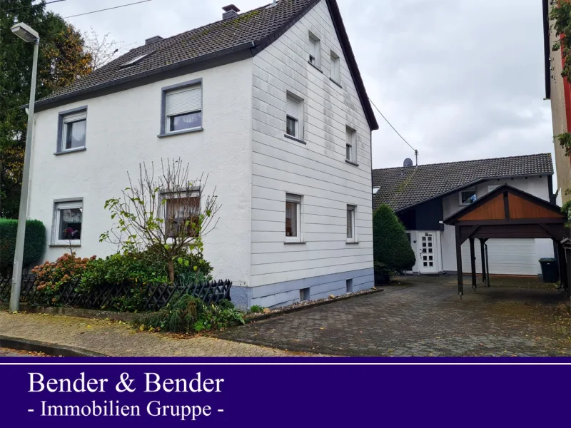 Gesamtansicht - Haus kaufen in Rengsdorf VG - Endlich genügend Platz - 2 Häuser auf einem Grundstück!