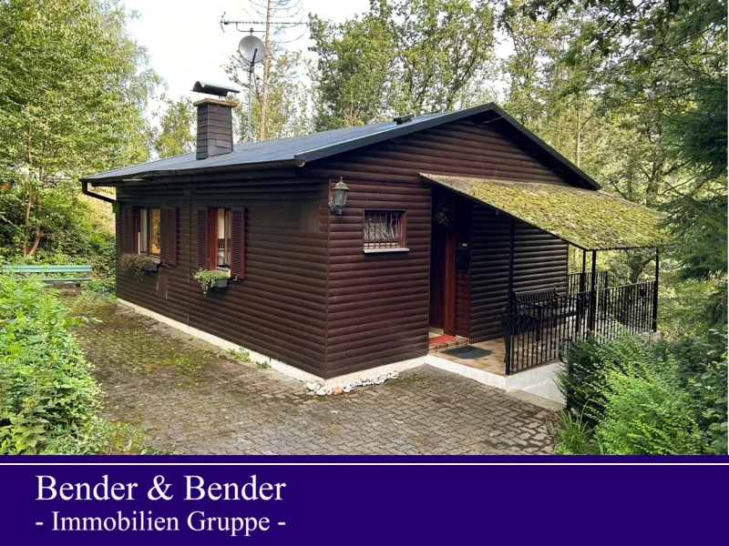 www.bender-immobilien.de - Haus kaufen in Morsbach - Kleines Ferienhaus in Waldrandlage mit Kamin!