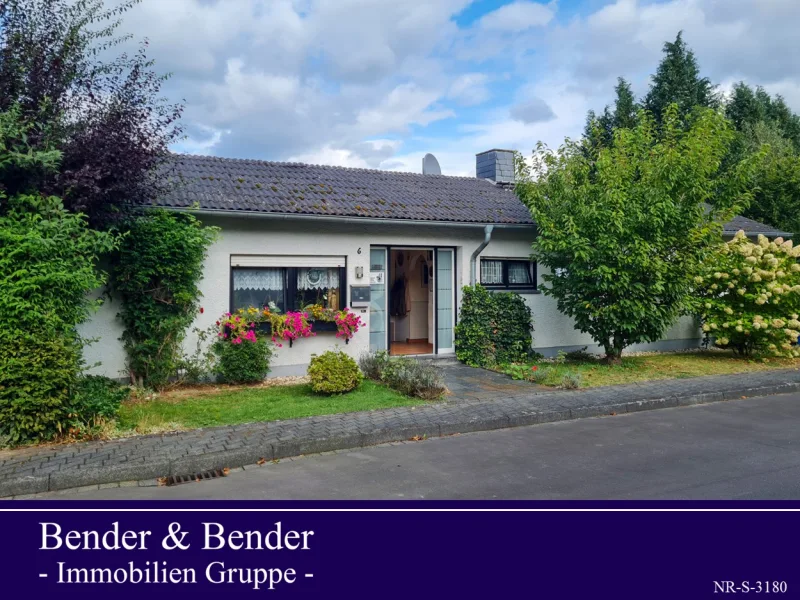 Vorderansicht - Haus kaufen in Puderbach - *PREISREDUZIERT* Gepflegter Bungalow mit großem Grundstück und Blick ins Grüne zu verkaufen!