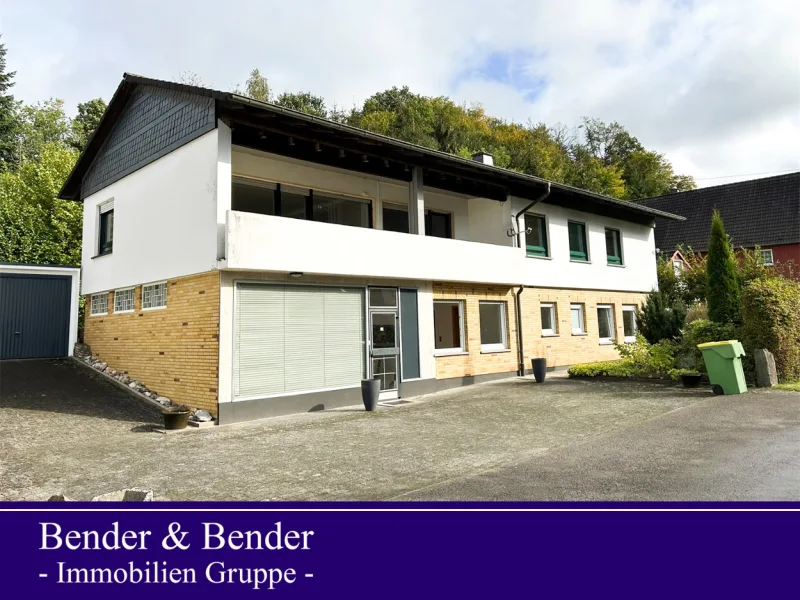 www.bender-immobilien.de - Haus kaufen in Reichshof - Solides Einfamilienhaus mit Einliegerwohnung in ruhiger Ortsrandlage von Reichshof!